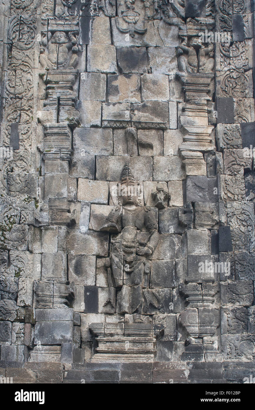 Wall carving at the 9th-century Buddhist temple, Candi Mendut, of Java, Indonesia. Stock Photo