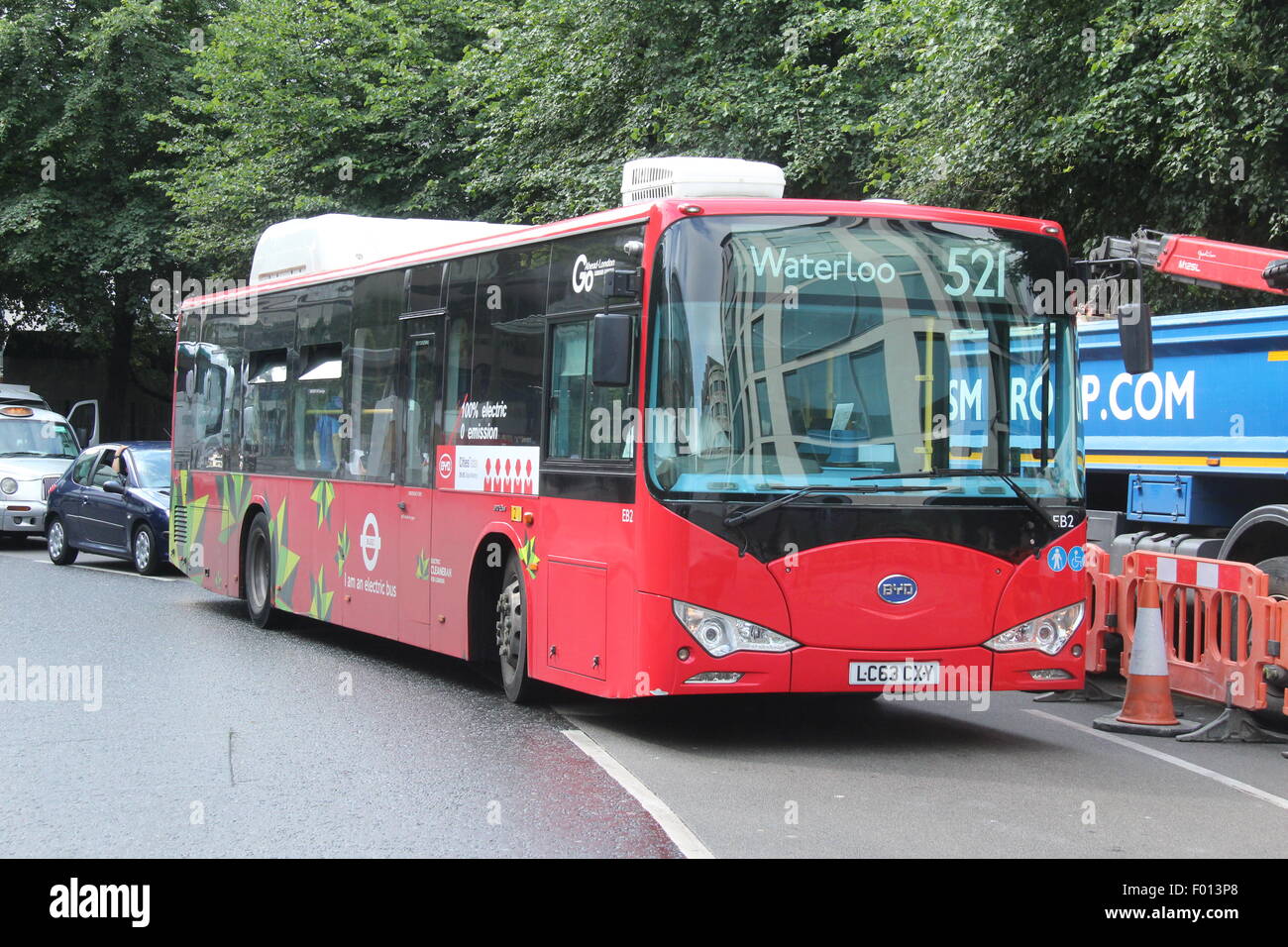 A green electric Chinese-made BYD bus working for tfl in London on route 521 to Waterloo operated by Go-Ahead London Stock Photo