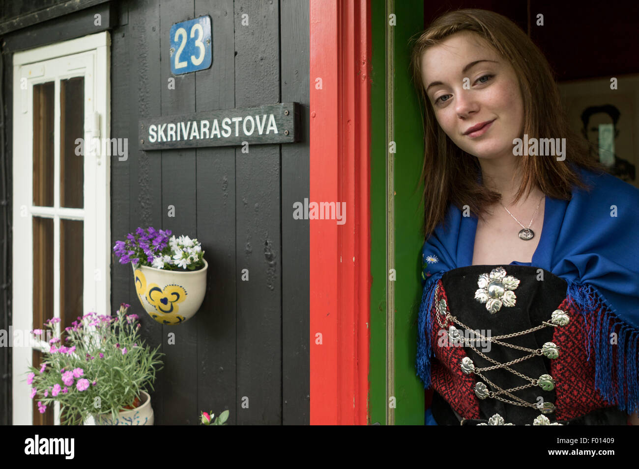 Faroese girl wearing tradition clothes in Tinganes, the historic area of  Torshavn, Streymoy Island. Faroe Islands Stock Photo - Alamy