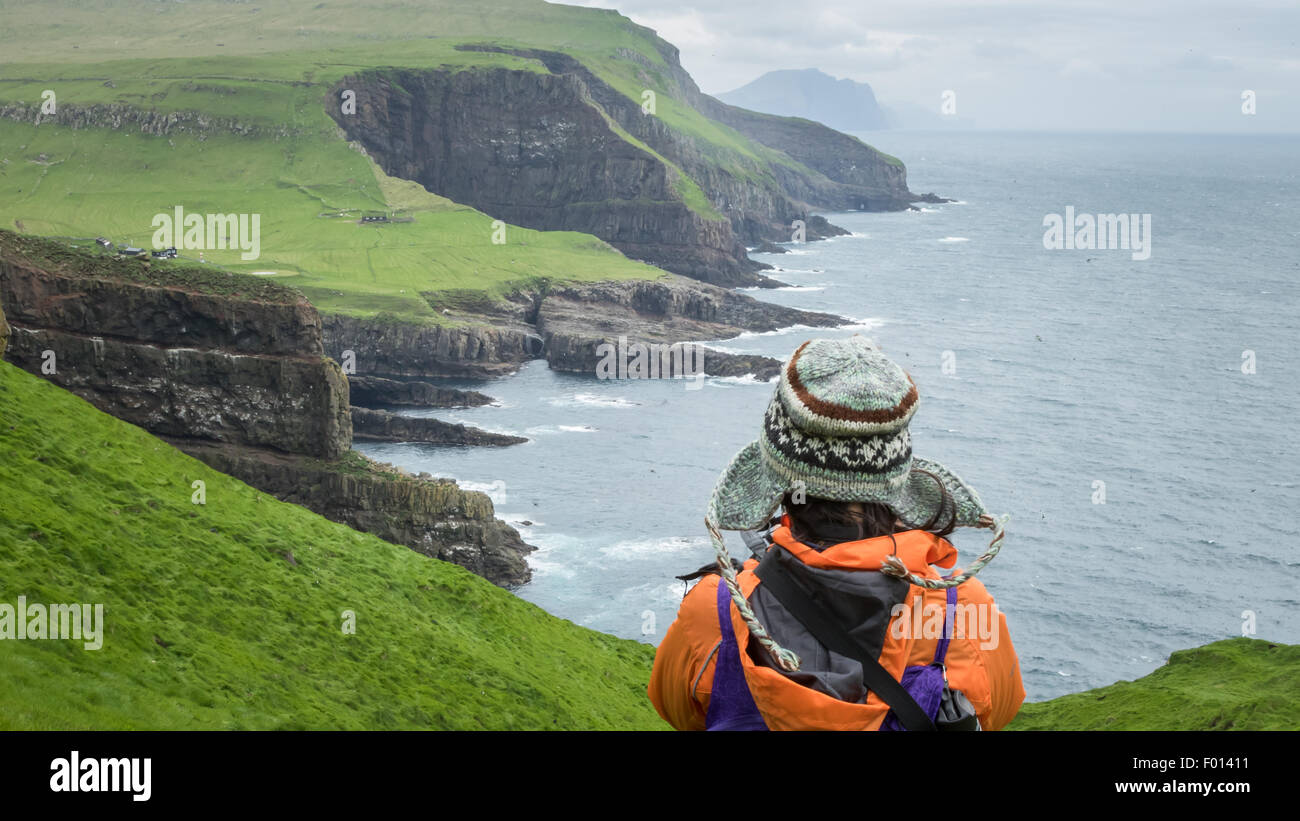 A tourist in Mykines. Faroe Islands Stock Photo