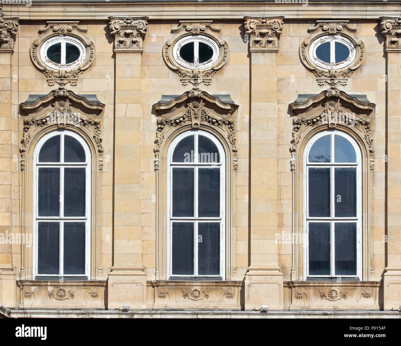 Three arched windows decorated mansion Stock Photo Alamy