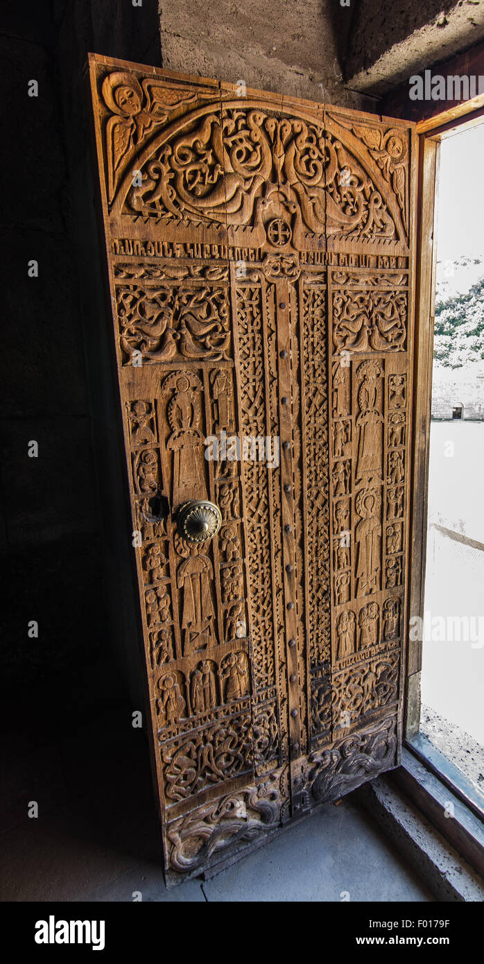 Intricately carved wooden door showcasing traditional design with ...