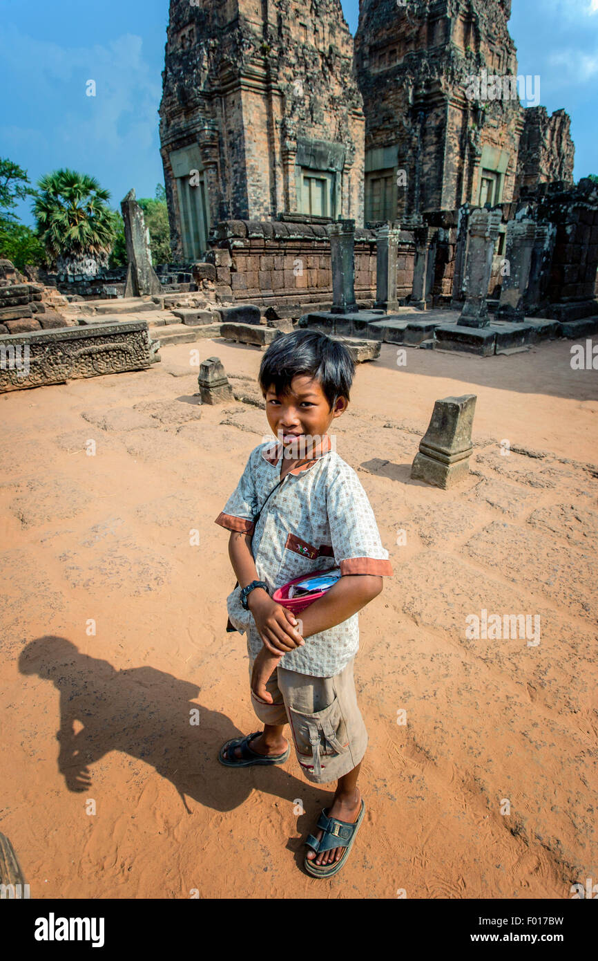 A young Cambodian boy at Angkor Wat, Cambodia Stock Photo