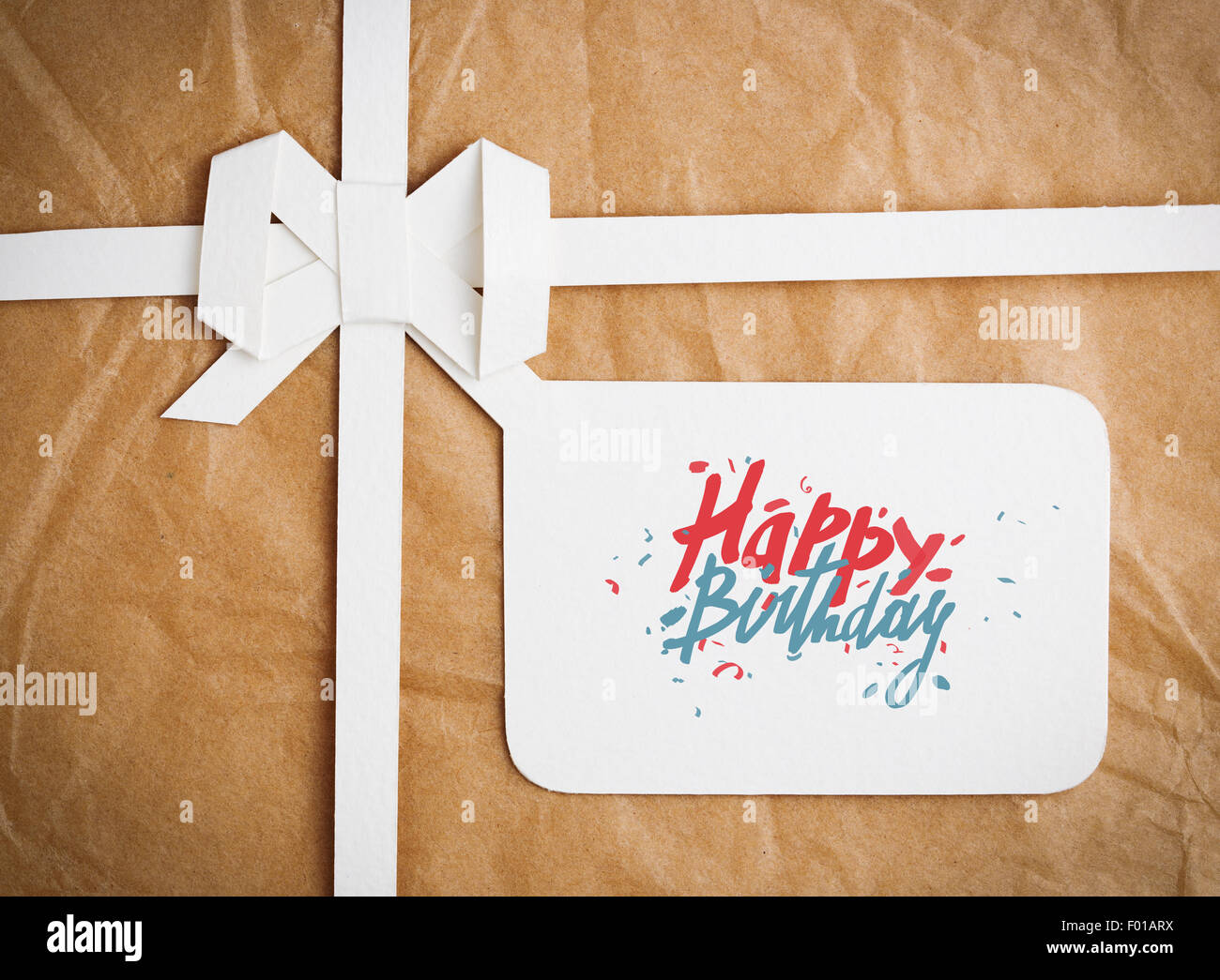 Gift box with Happy Birthday on gift tag Stock Photo