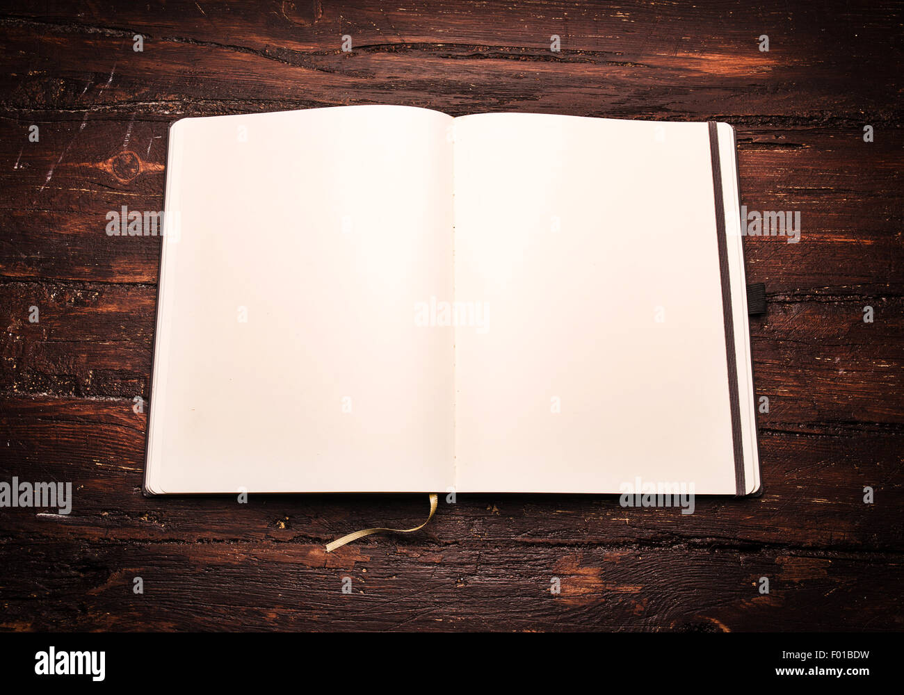 Blank notepad with pen on wood table, free space for text Stock Photo