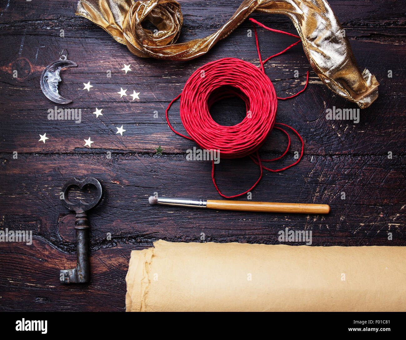 Decoration elements for craft on old wooden table. Decorator workplace.Holiday background Stock Photo