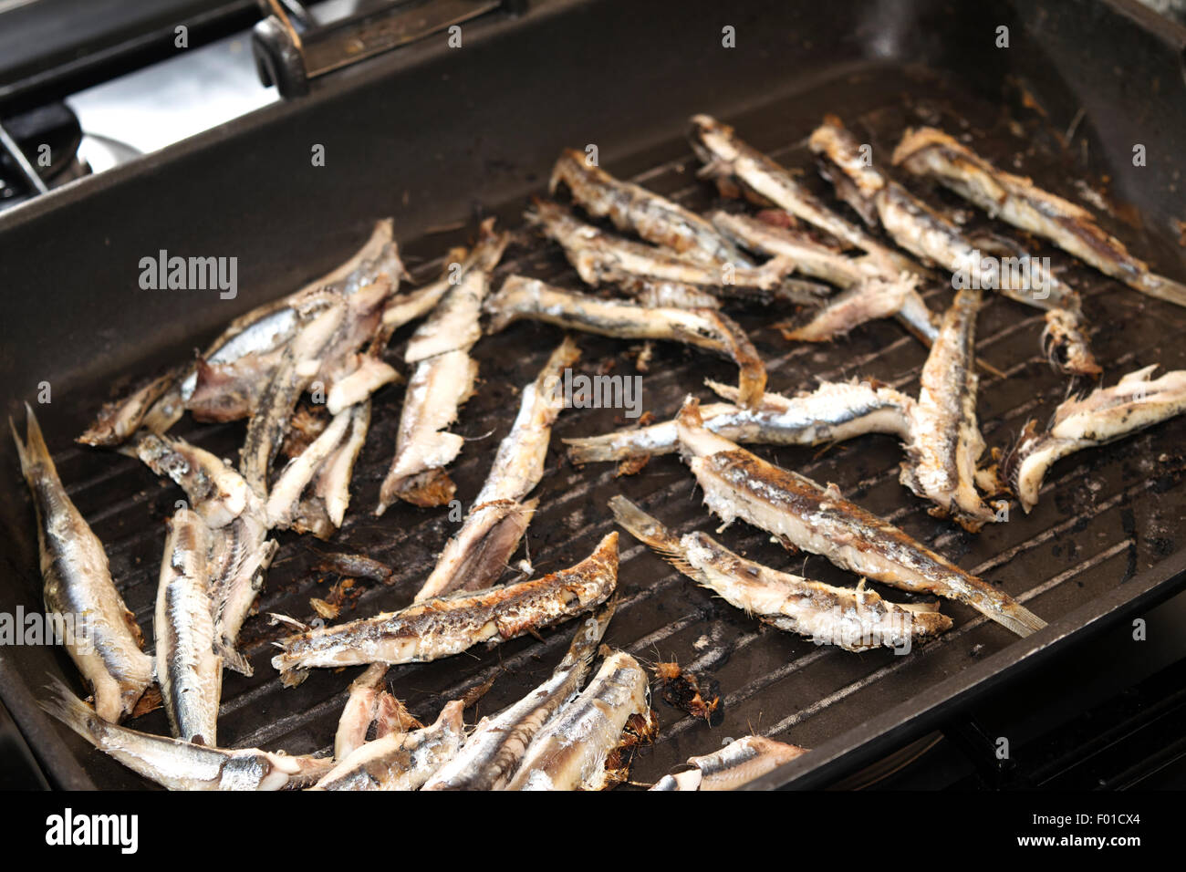 fresh anchovies of market of the mediterranean sea roasted on the