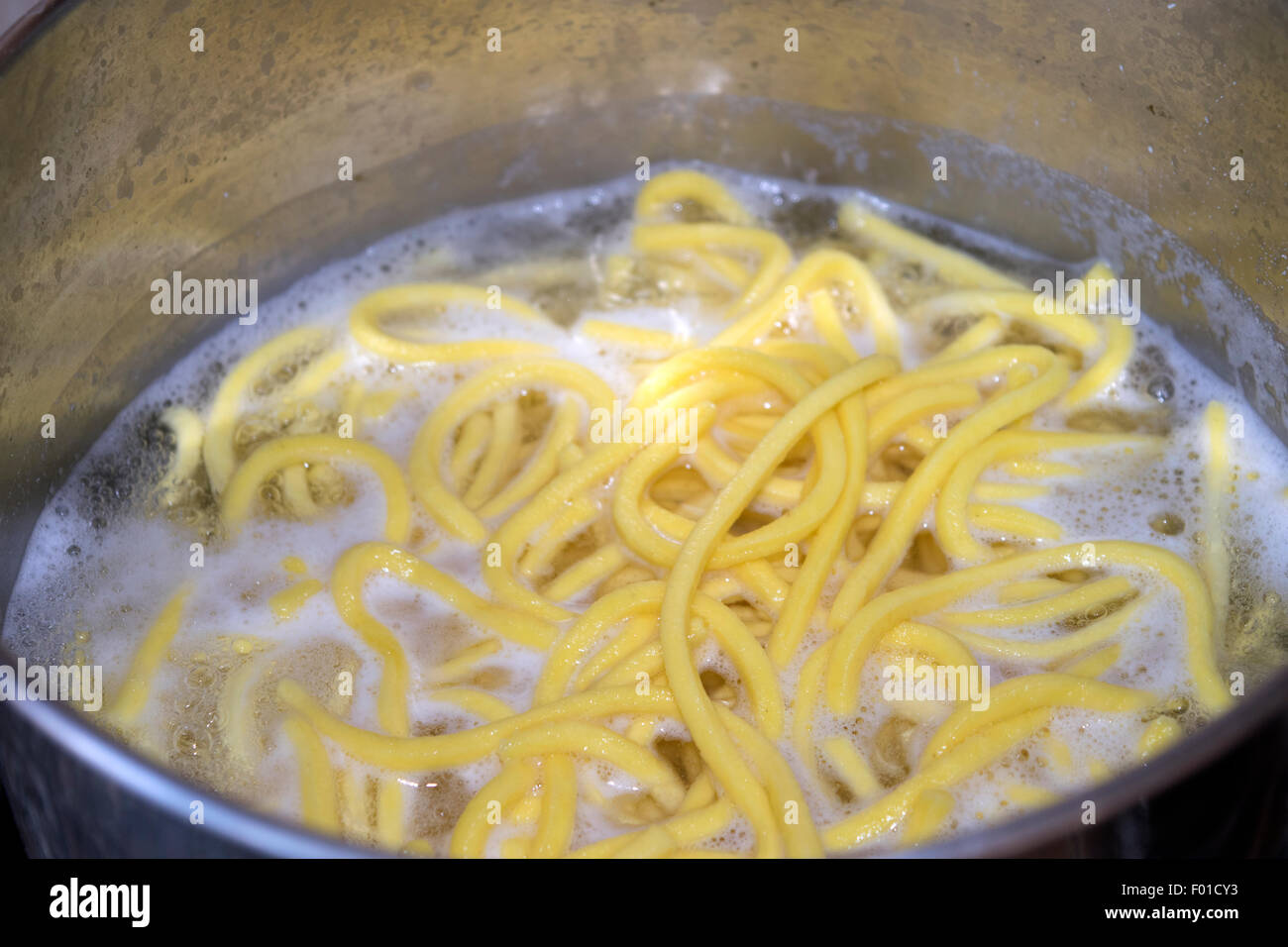 boiling of pasta in a saucepan with water boiling Stock Photo Alamy