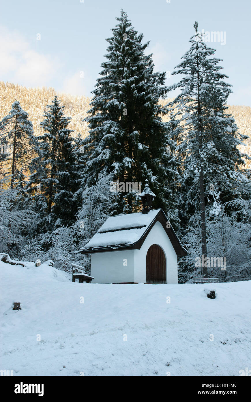 A tiny church beside a mountain road in Austria Stock Photo