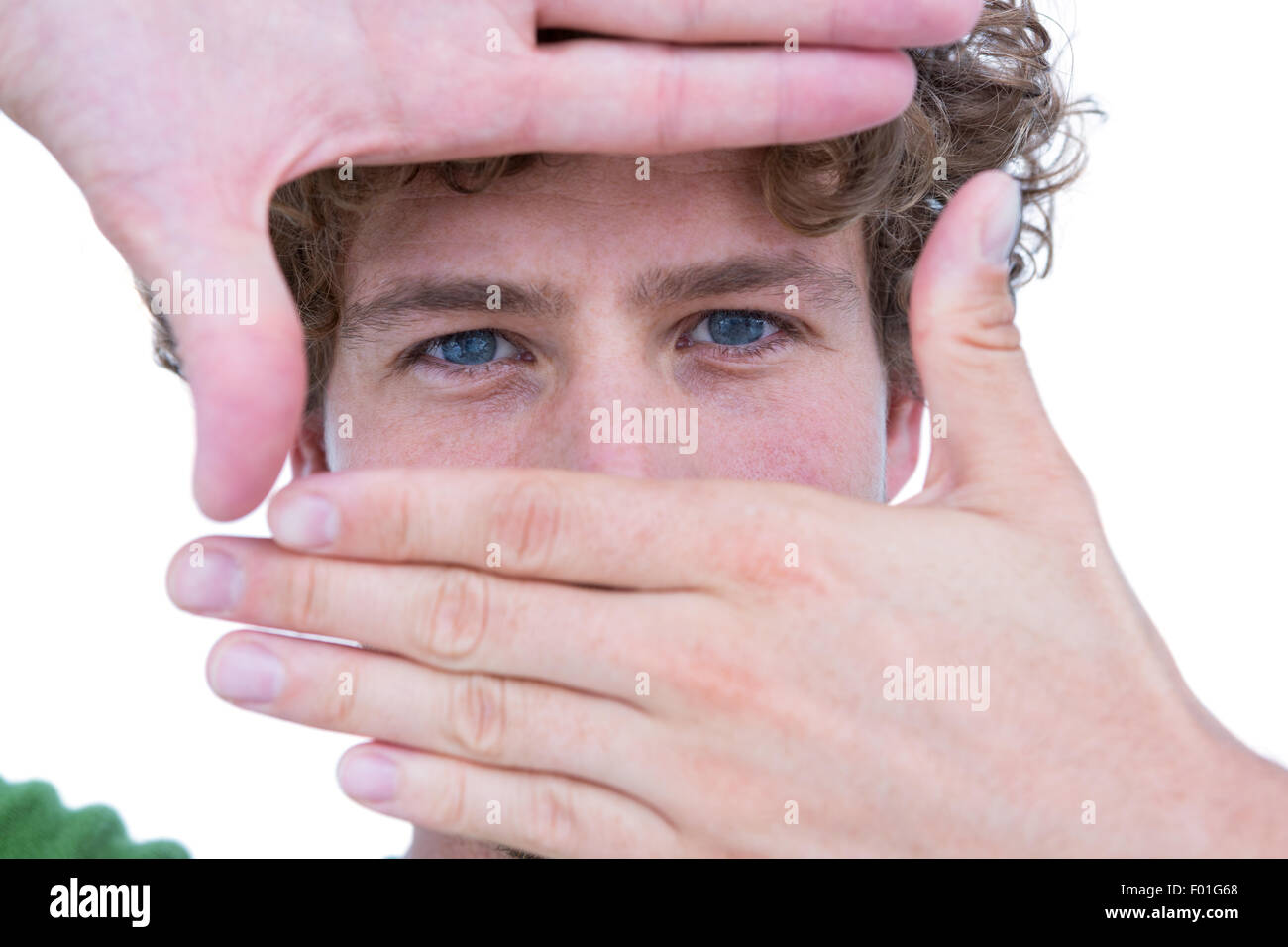 Handsome man looking at camera and gesturing Stock Photo - Alamy