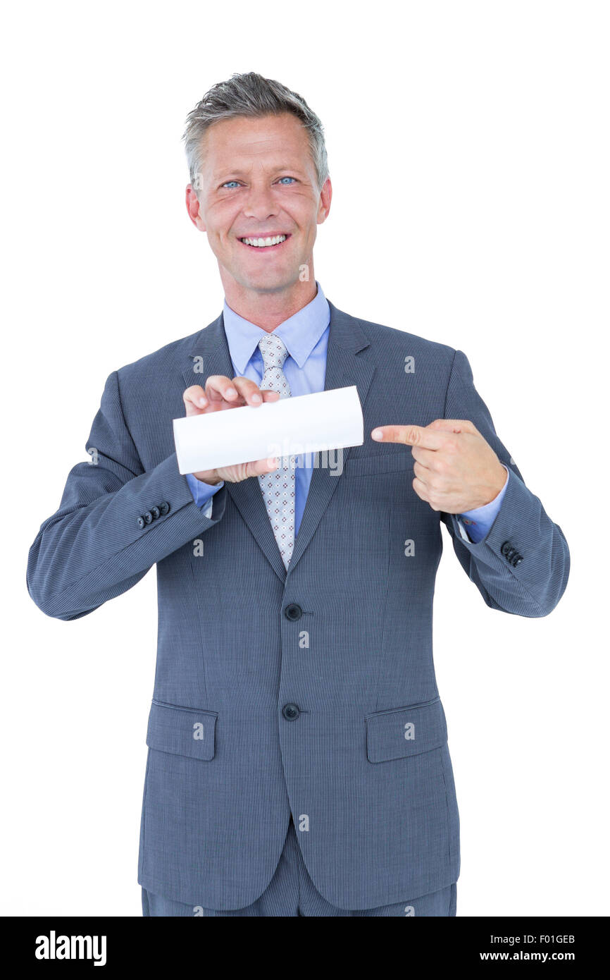 Businessman holding a white sign Stock Photo