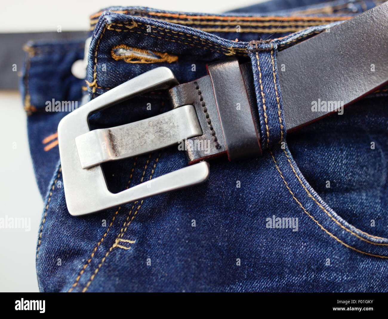 Jeans with belt, close up photo Stock Photo Alamy