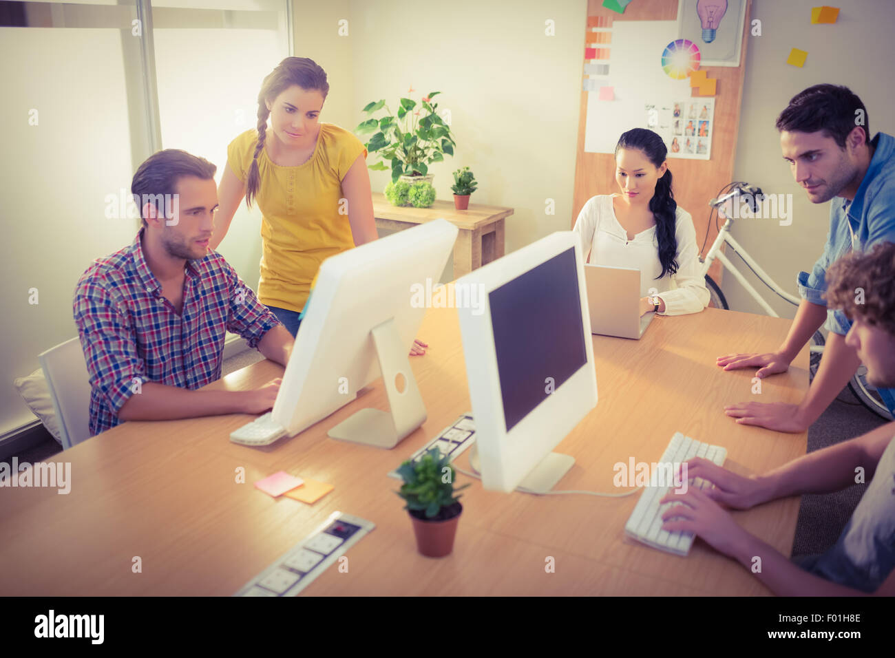 Group working on laptops hi-res stock photography and images - Alamy