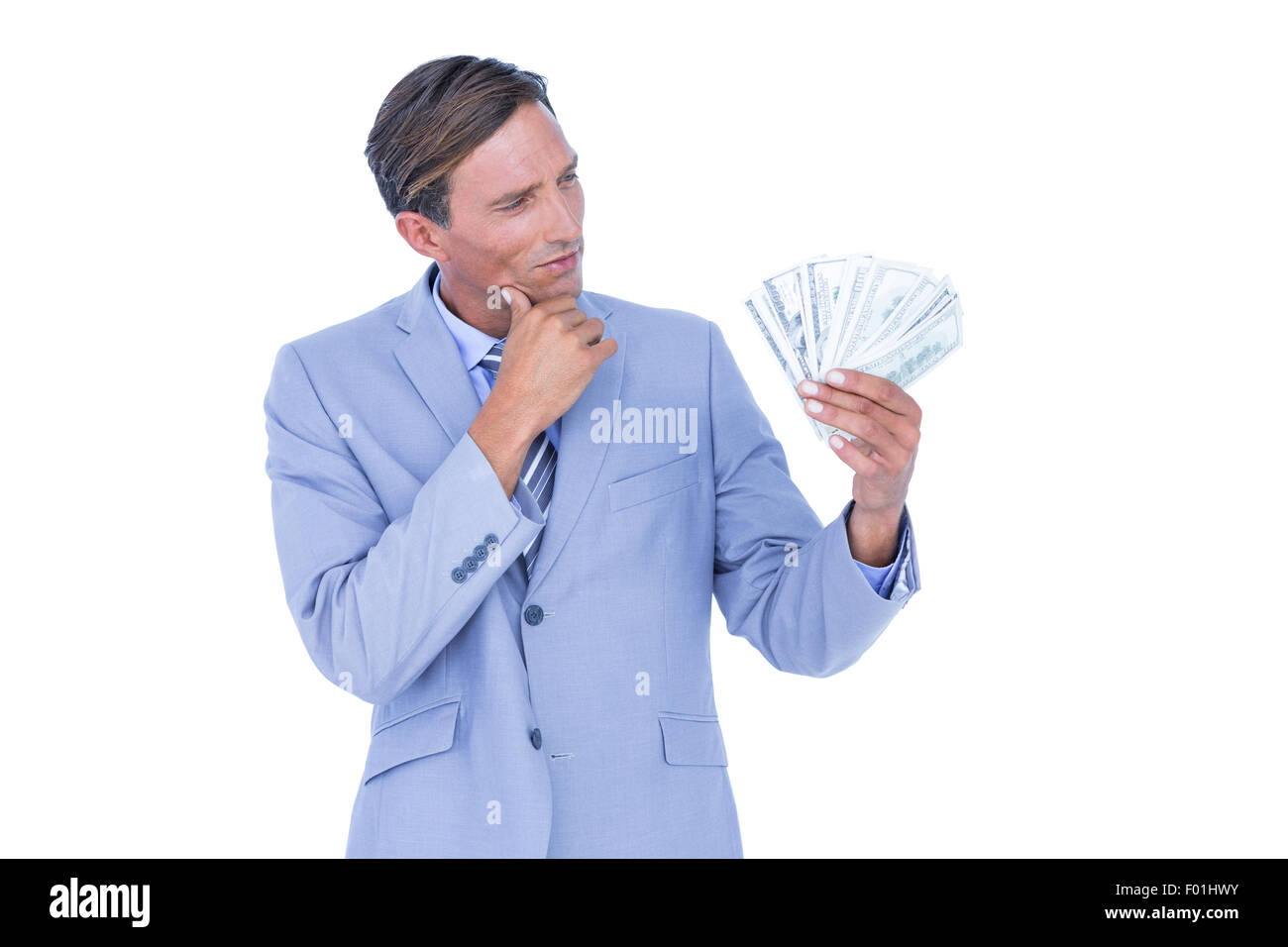 businessman holding bribe Stock Photo