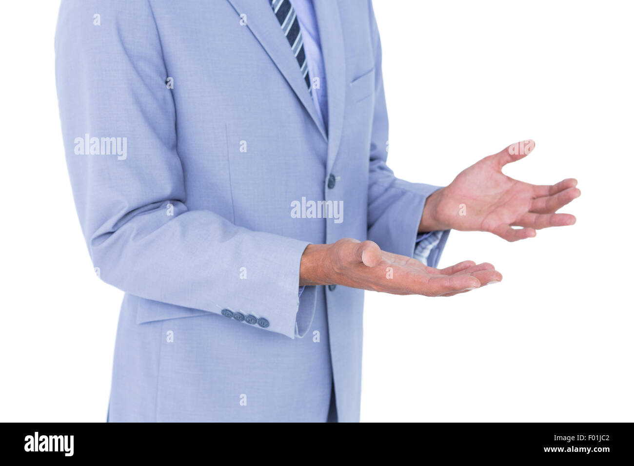 Handsome businessman gesturing with hands Stock Photo
