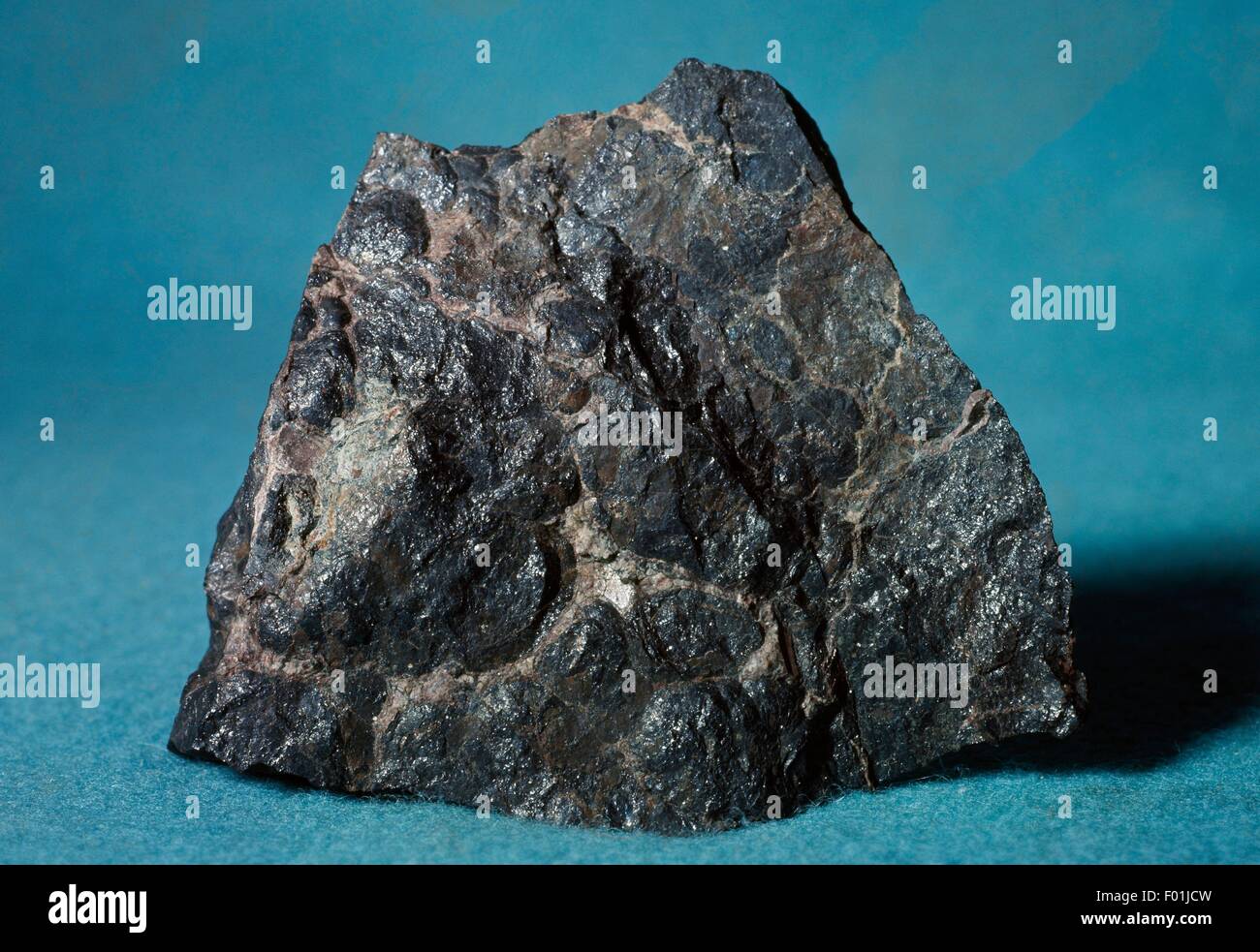 Uraninite or Pitchblende, oxide, radioactive mineral. Stock Photo