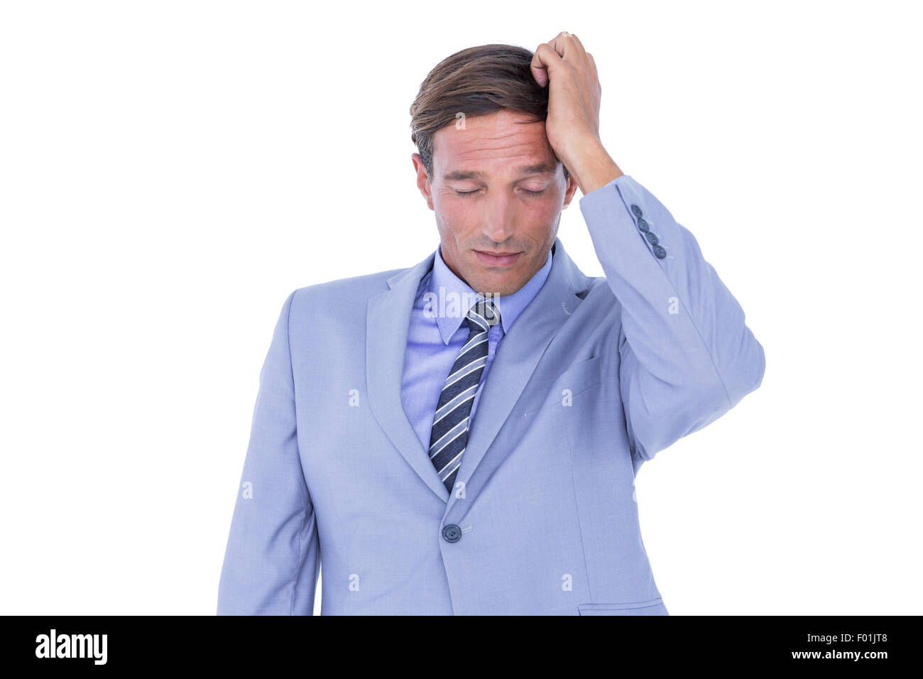 Stressed businessman getting a headache Stock Photo