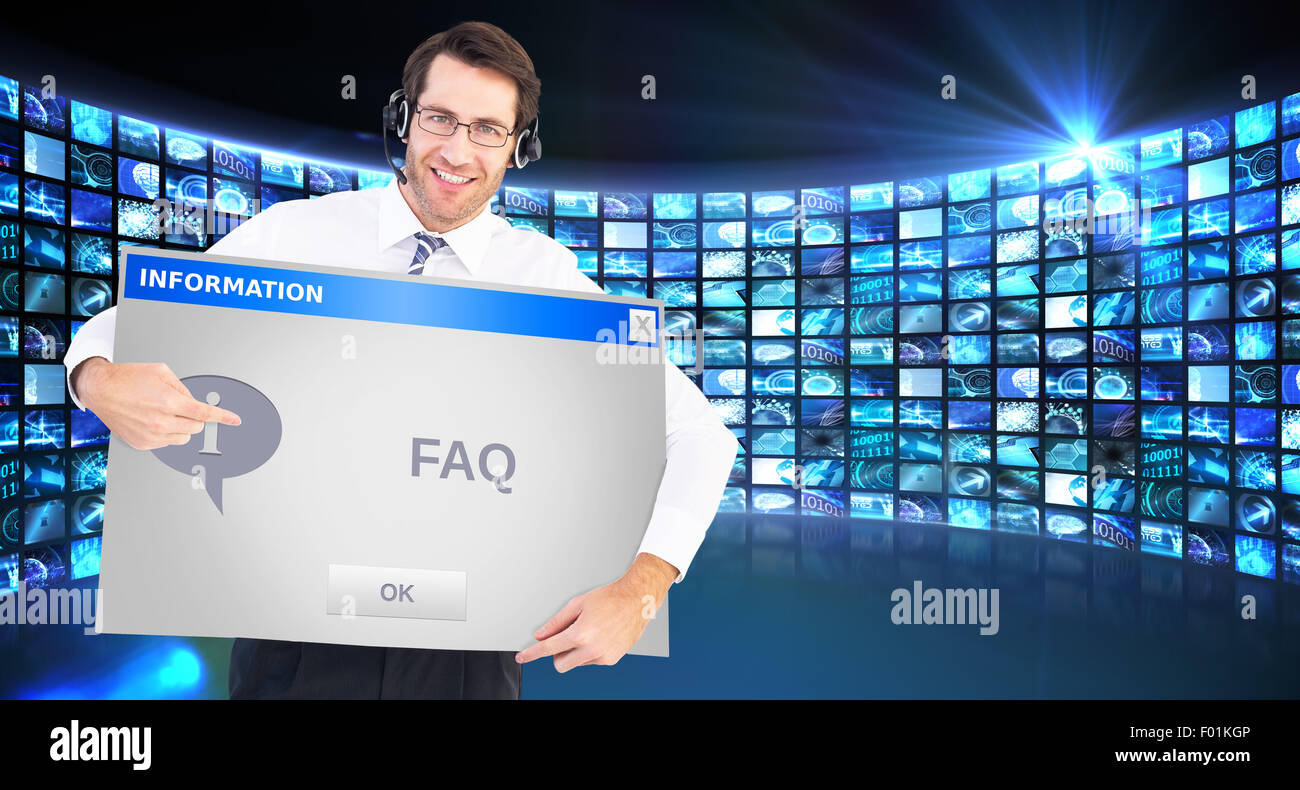 Composite image of happy businessman showing card to camera Stock Photo