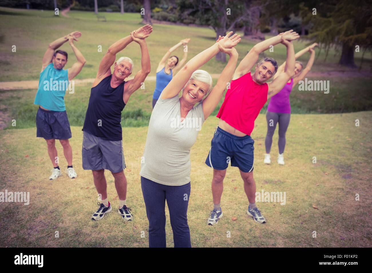 Happy athletic group training Stock Photo Alamy