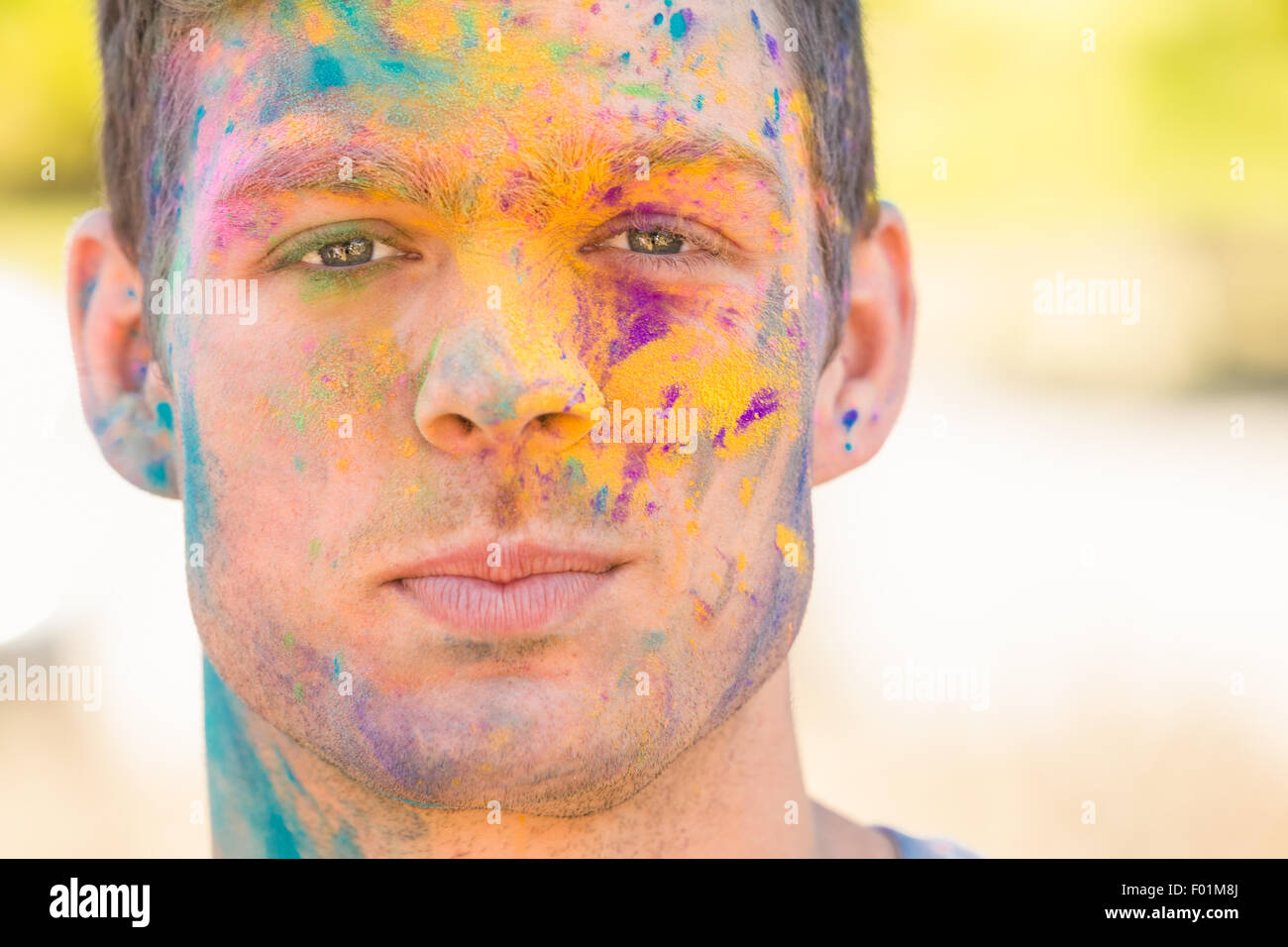 Powder Paint Playing Young man having fun with powder paint Stock Photo - Alamy