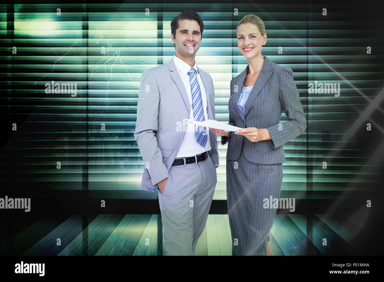 Composite image of business people looking at camera Stock Photo - Alamy