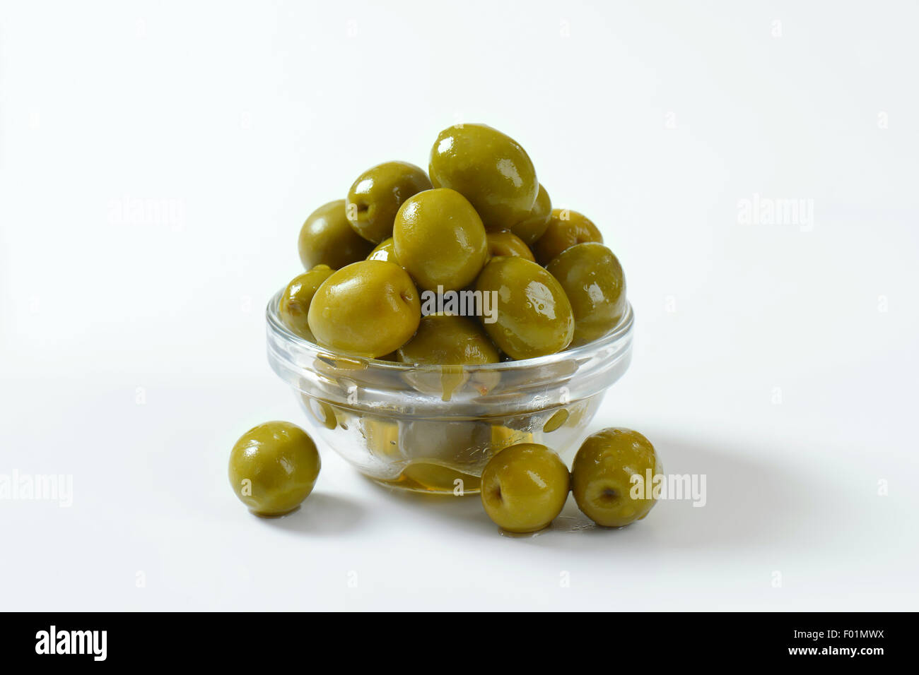 Bowl of brine cured green olives Stock Photo Alamy