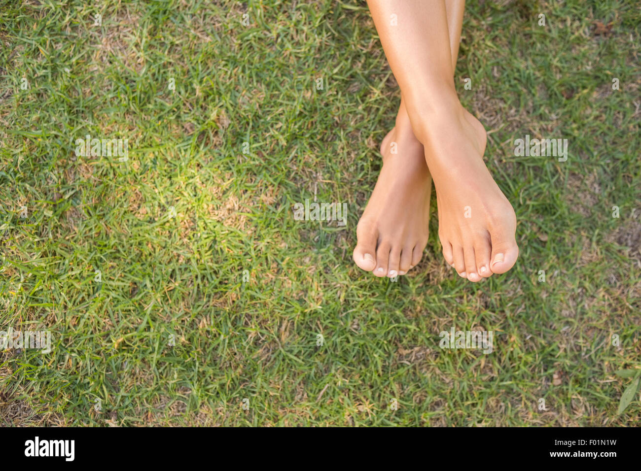 Barefoot in the grass Stock Photo