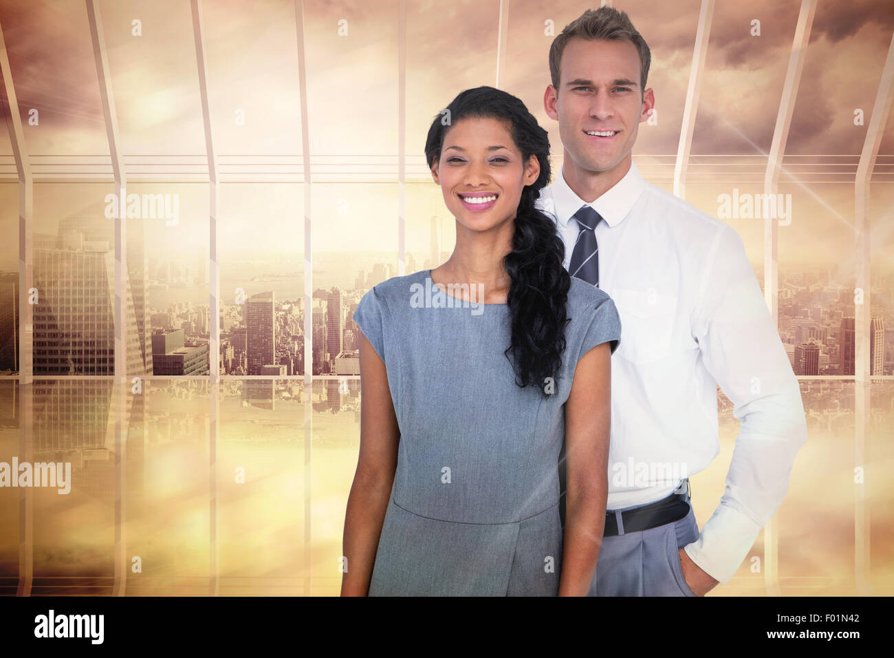 Composite image of happy business people smiling at camera Stock Photo ...