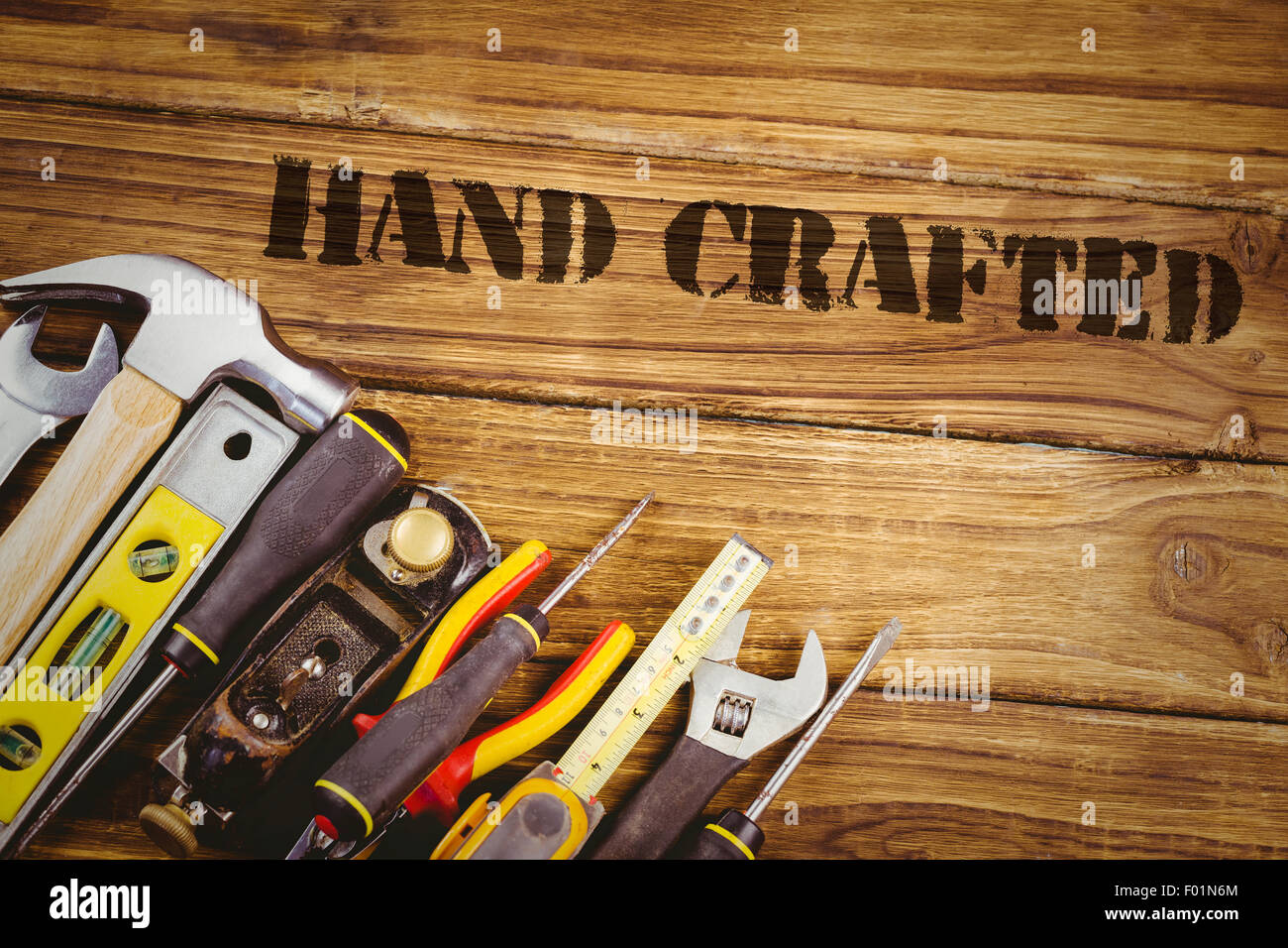 Hand crafted against tools on desk Stock Photo