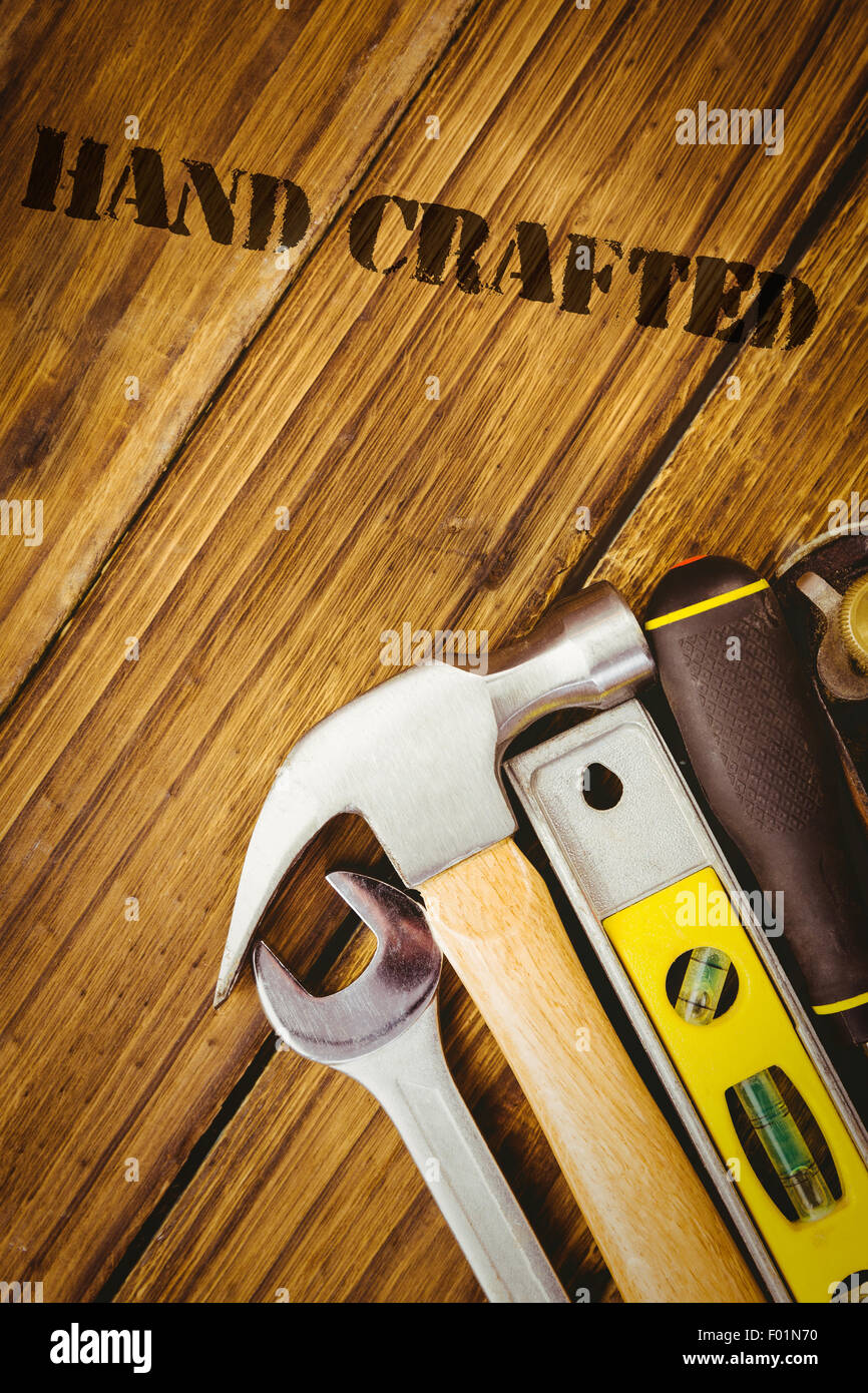 Hand crafted against desk with tools Stock Photo