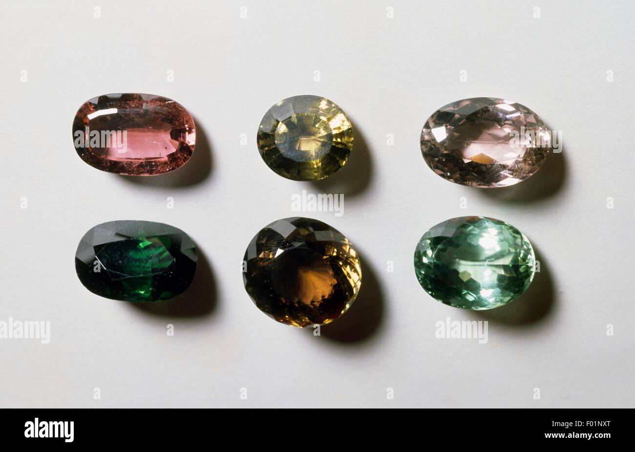 Tourmaline specimens, silicate, in different colors and cuts. Stock Photo
