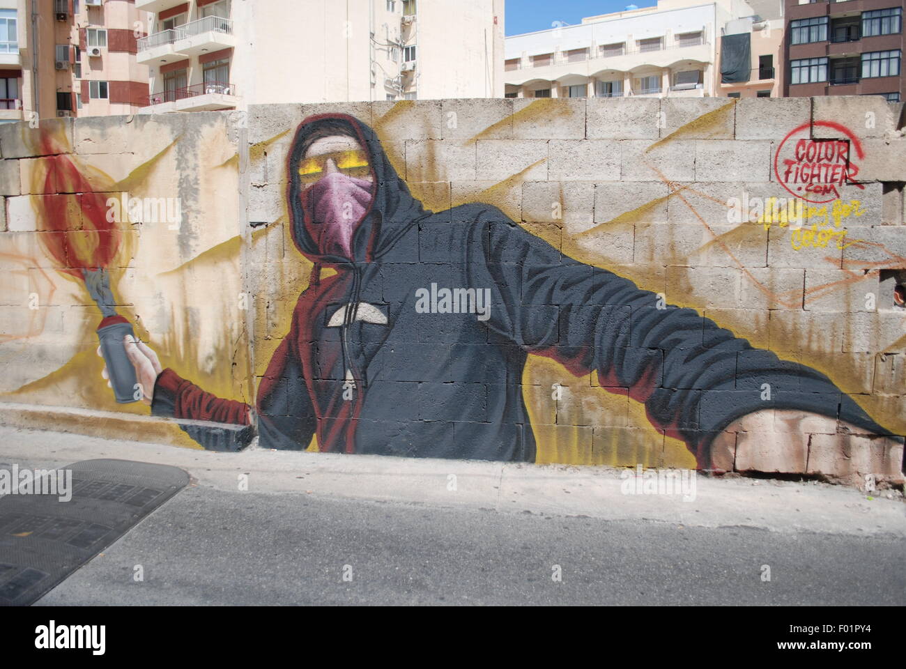 Graffiti image of a Molotov-cocktail throwing masked fighter