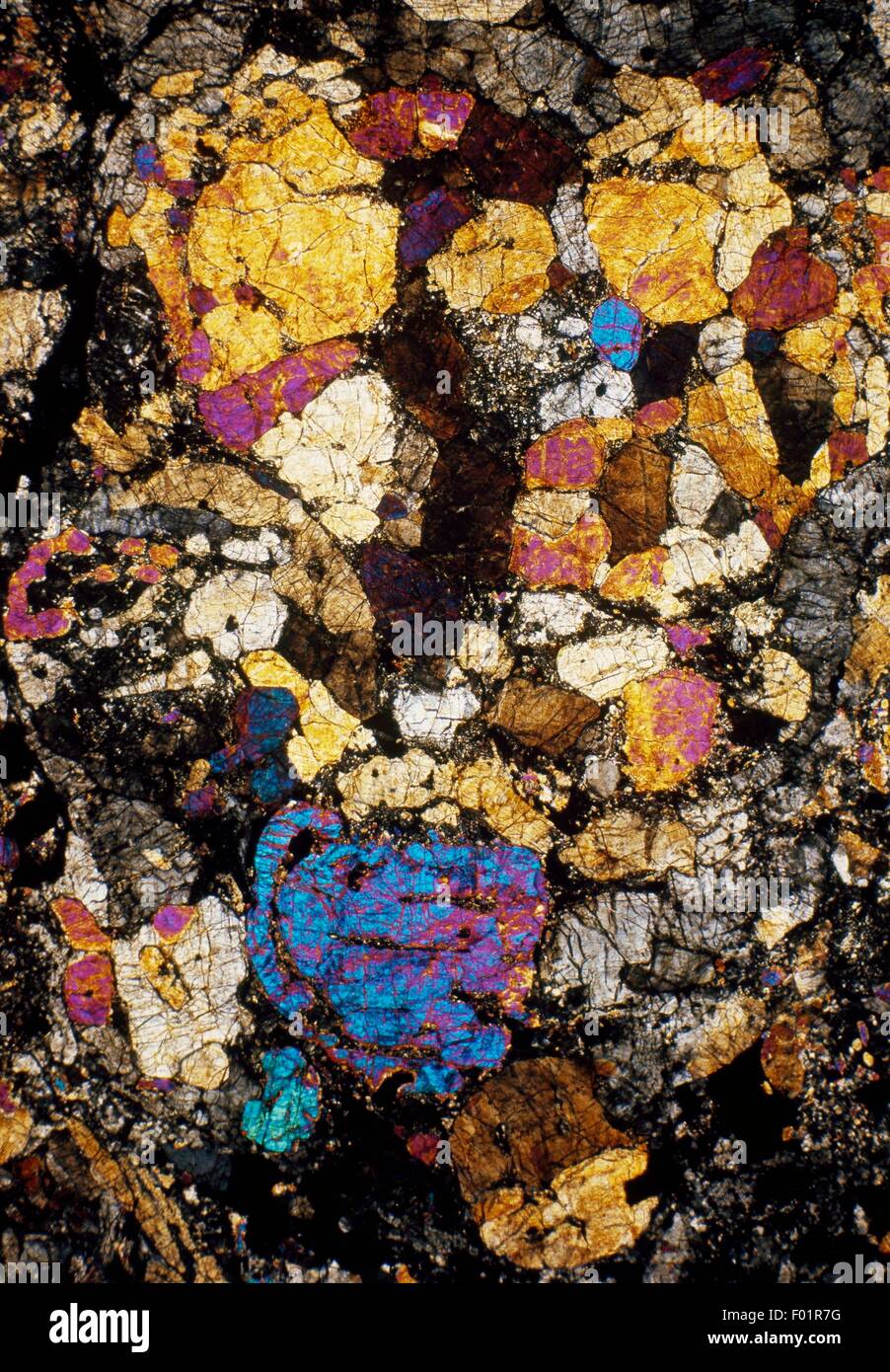 Chondrite, Bluff stony meteorite, from Texas (United States), thin section, using crossed Nicols, x19x1,5. Stock Photo