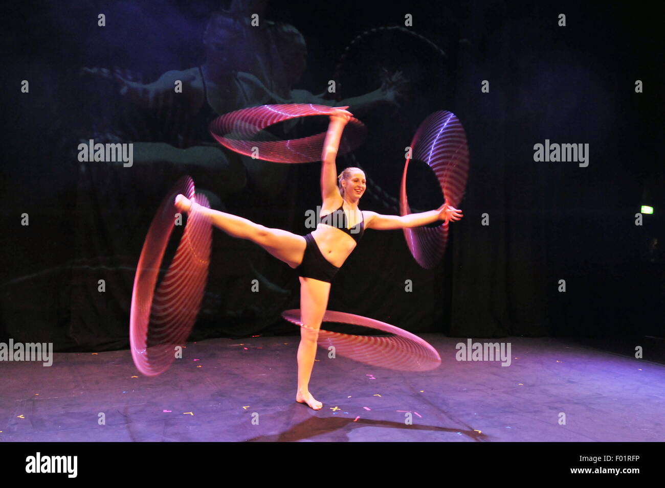 Hula Hoop artist from Circa performing at the Underbelly Press Launch at  the Edinburgh Fringe 2015, in a show called Close Up Stock Photo - Alamy