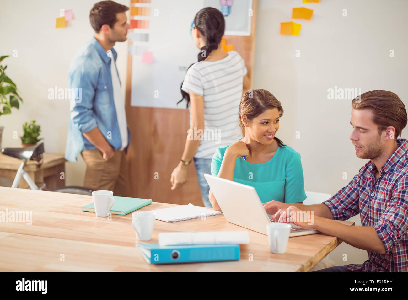 Creative business team working together Stock Photo - Alamy