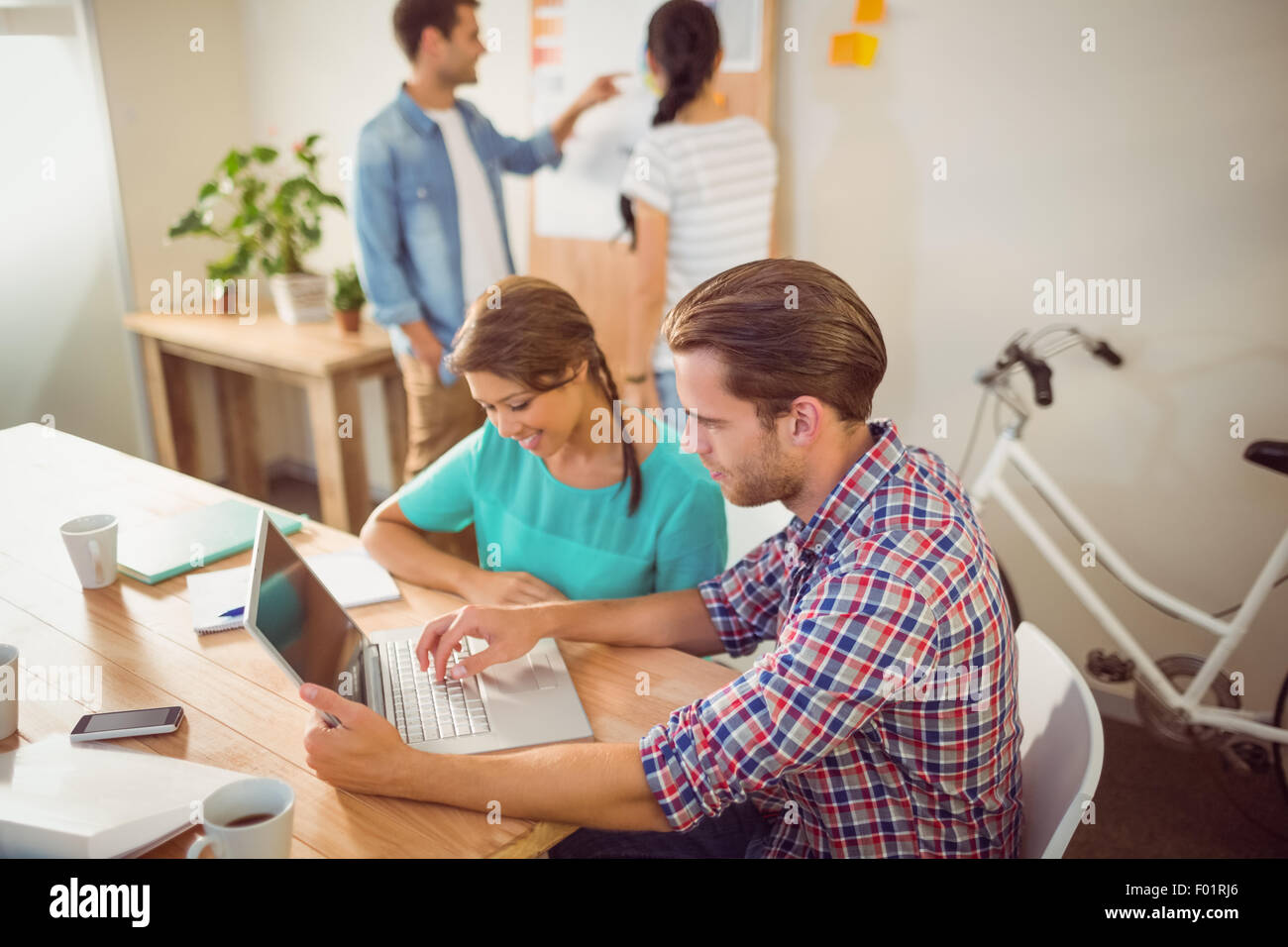 Creative business team working together Stock Photo - Alamy