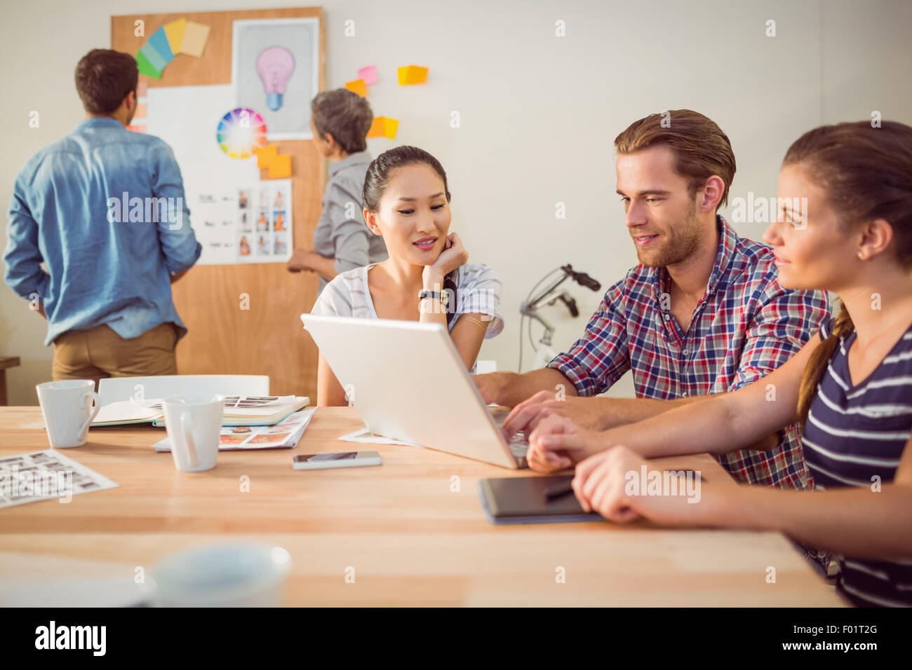 Creative business team working together Stock Photo - Alamy