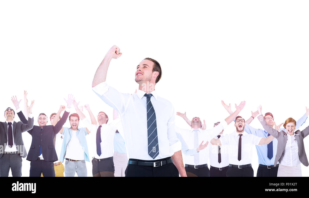 Composite image of businessman cheering with clenched fist Stock Photo ...