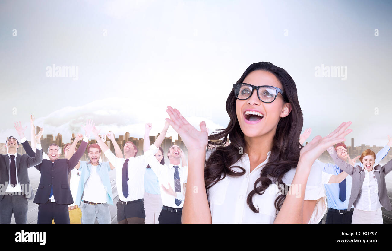 Composite image of pretty brunette in hipster glasses Stock Photo