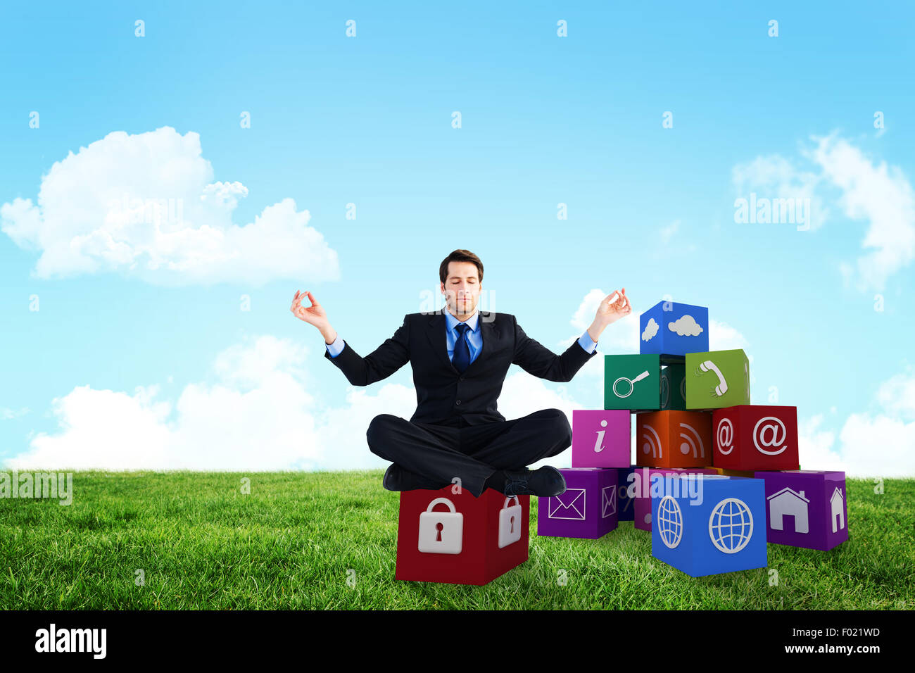 Composite image of calm businessman sitting in lotus pose Stock Photo