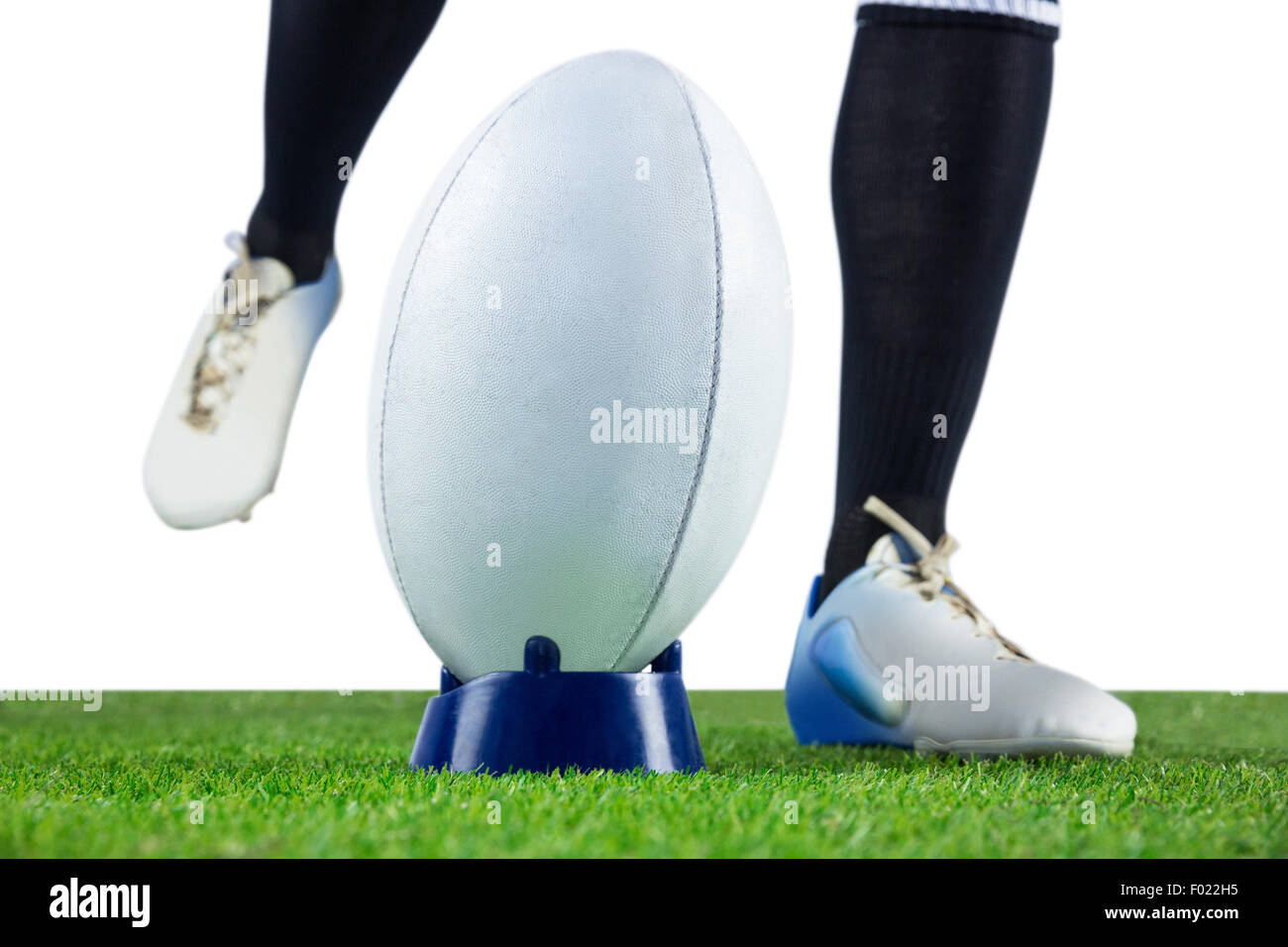 Rugby player doing a drop kick Stock Photo Alamy