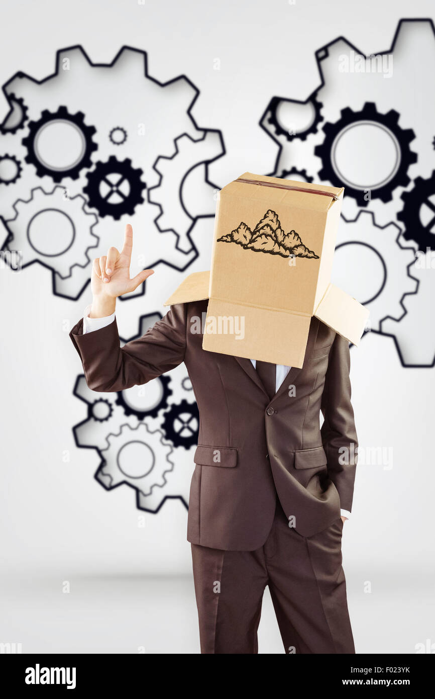 Composite image of anonymous businessman pointing up with finger Stock Photo