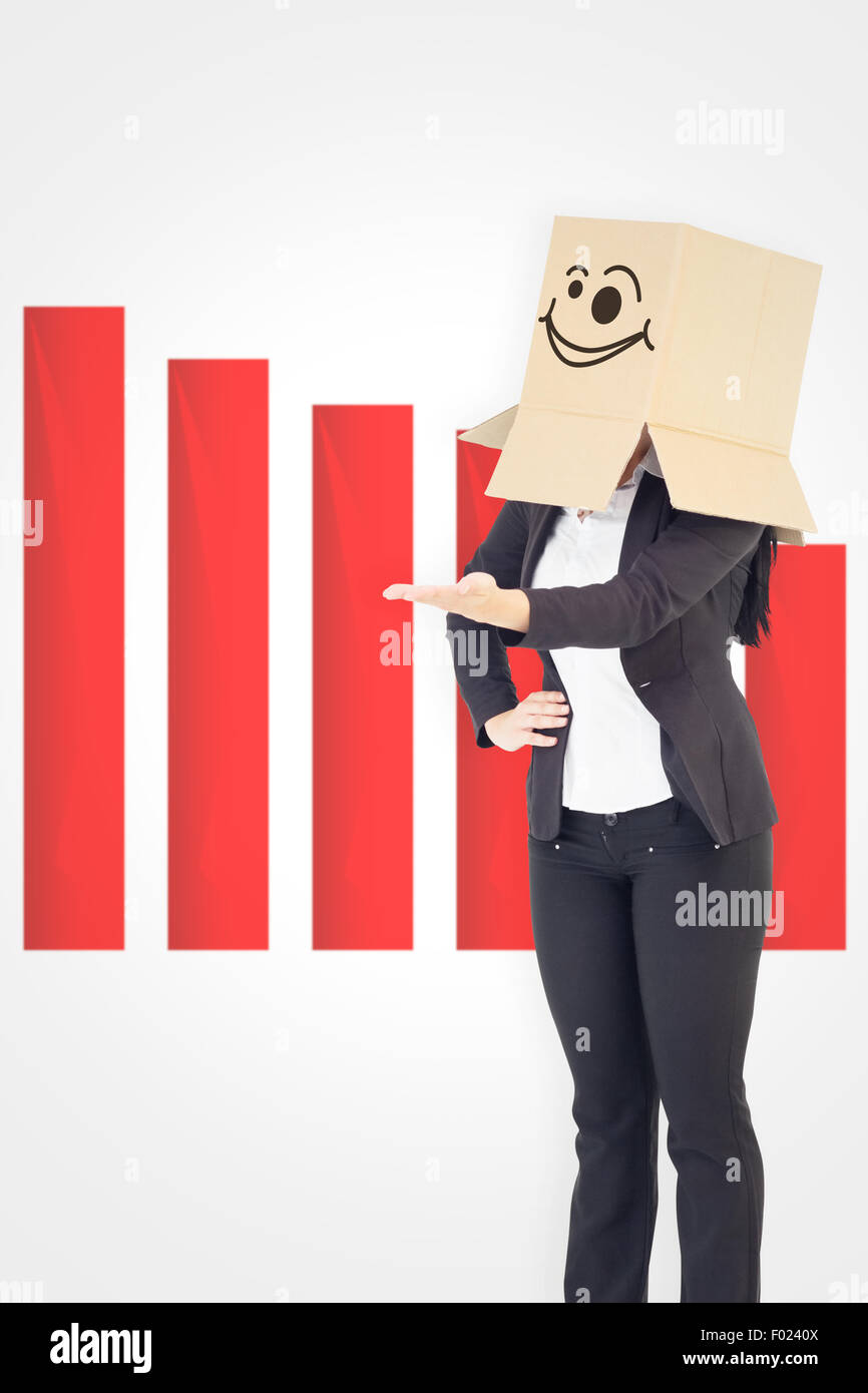 Composite image of businesswoman presenting with box over head Stock Photo