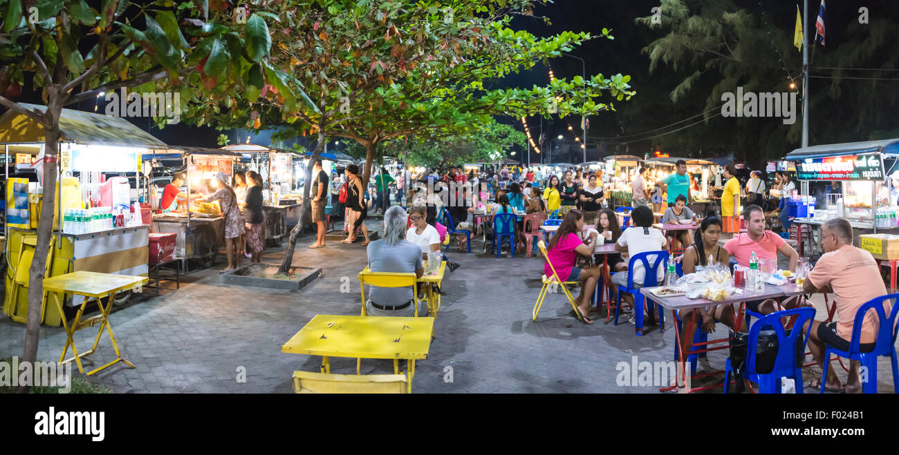 People, tourists and locals eating at a night market, Na Thon, Koh Samui, Thailand Stock Photo