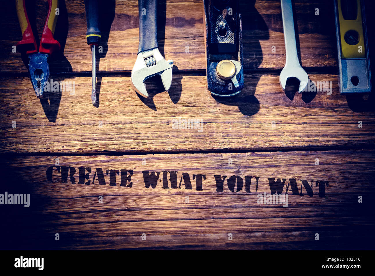 Create what you want against desk with tools Stock Photo - Alamy