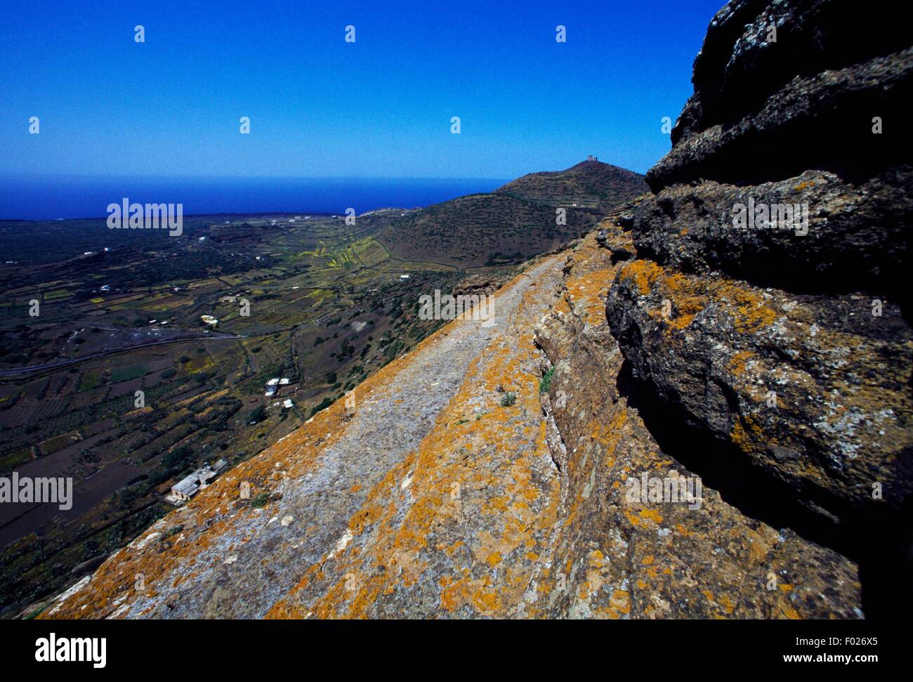 Tiers of red rock, Linosa, Pelagie Islands, Sicily, Italy. Stock Photo