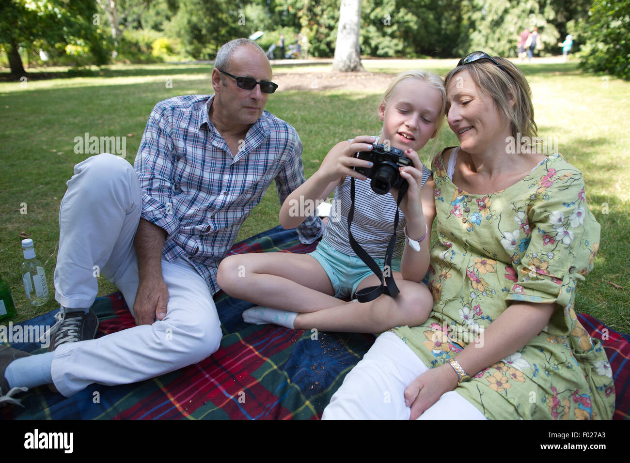 Family enjoying a relaxing day out at RHS Garden Wisley, Surrey, England, UK Stock Photo