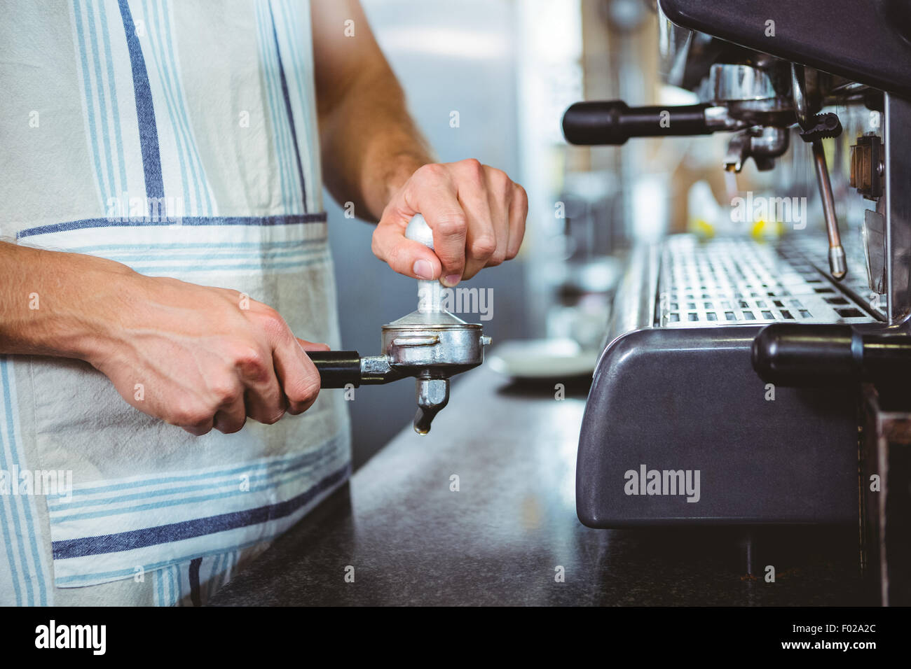 happy worker making coffee Stock Photo