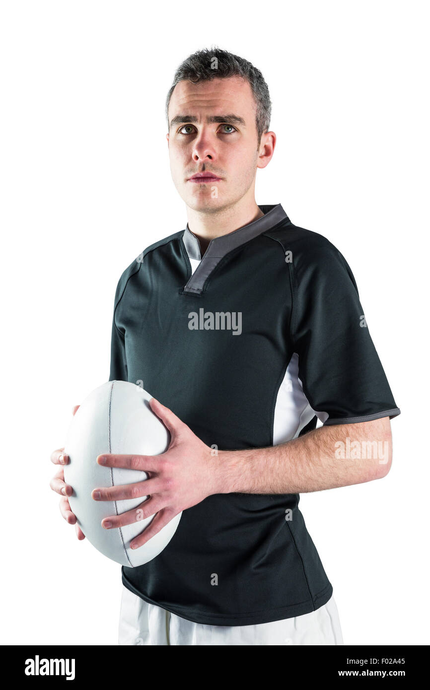 Rugby player holding a rugby ball Stock Photo Alamy