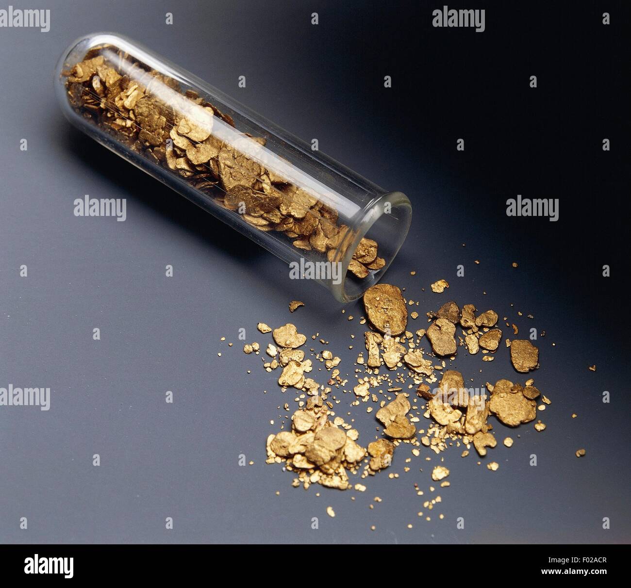 Gold in a test tube, native element Stock Photo Alamy